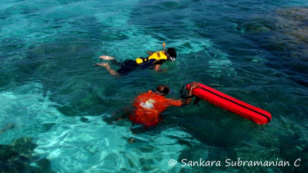 snorkeling in the coral-rich waters of the Lagoon Kavaratti