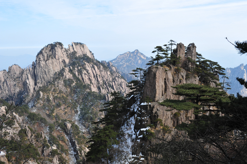 Rocky Peaks of Mountain Huangshan Floating Among the Clouds