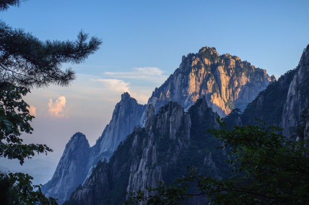 Rocky Peaks of Mountain Huangshan Floating Among the Clouds