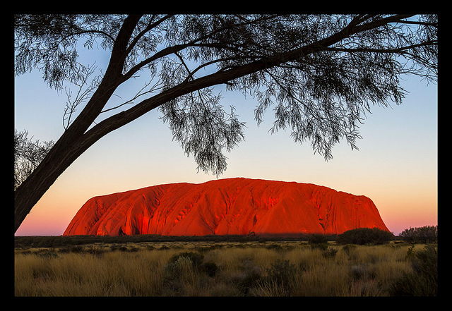 See The Sunset And The Incredible Bright Red Color Of Mountain Uluru