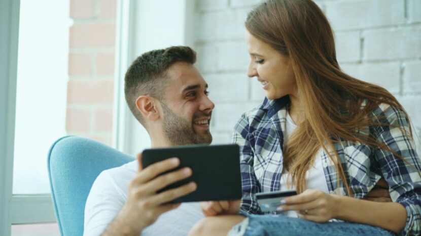 couple-tablet-credit-card-830x467 How Small Households End Up Paying for Way More Internet Than They Need