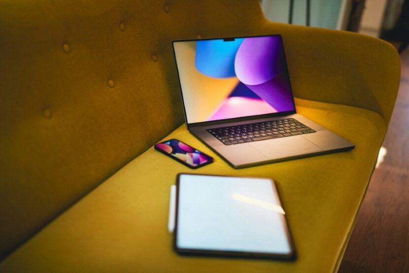 laptop-computer-yellow-couch-830x554 How Small Households End Up Paying for Way More Internet Than They Need