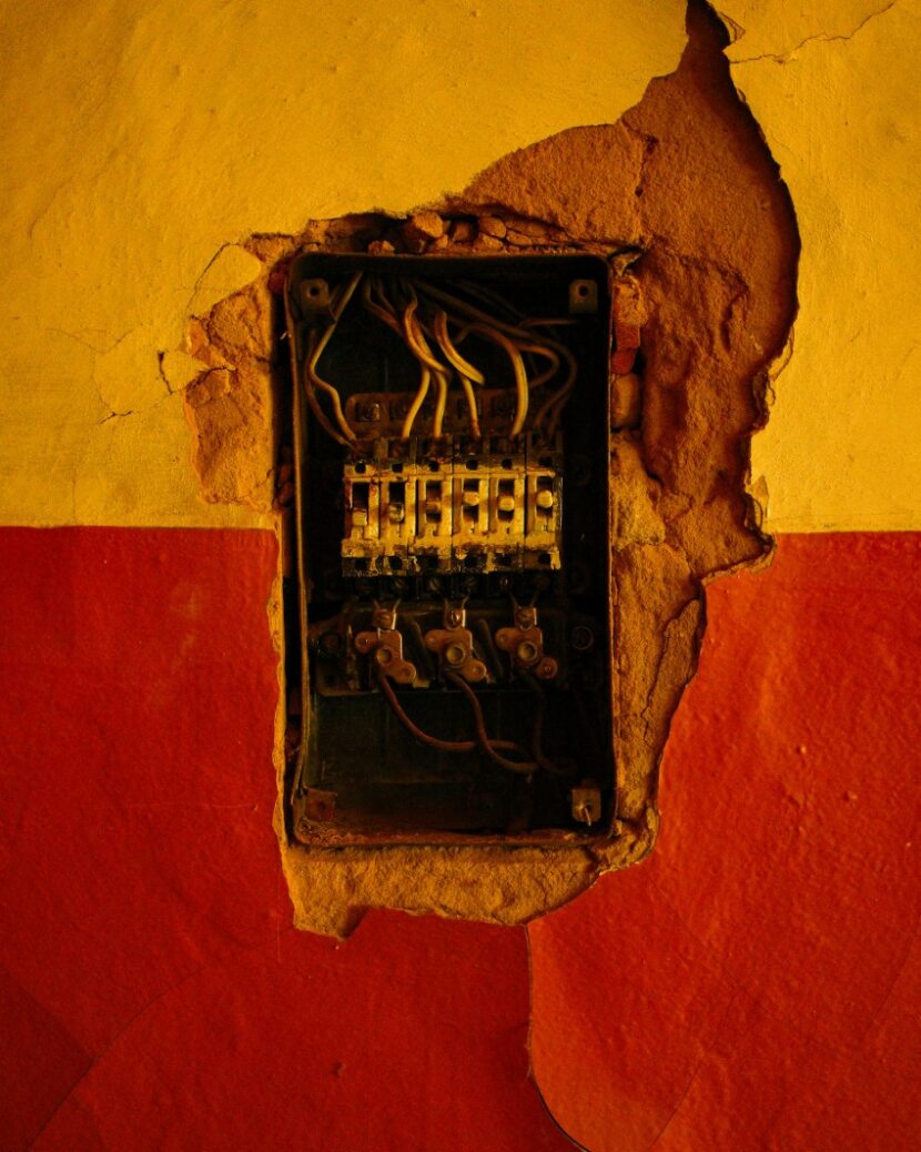 old-electrical-panel-830x1038 Is Your Dallas Home's Electrical System Hiding Dangers?